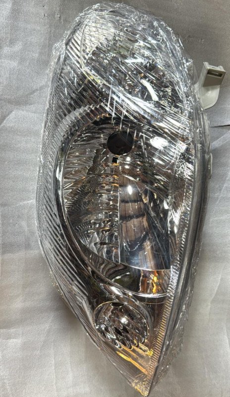 Faro delantero LH Toyota Corolla 01/02
