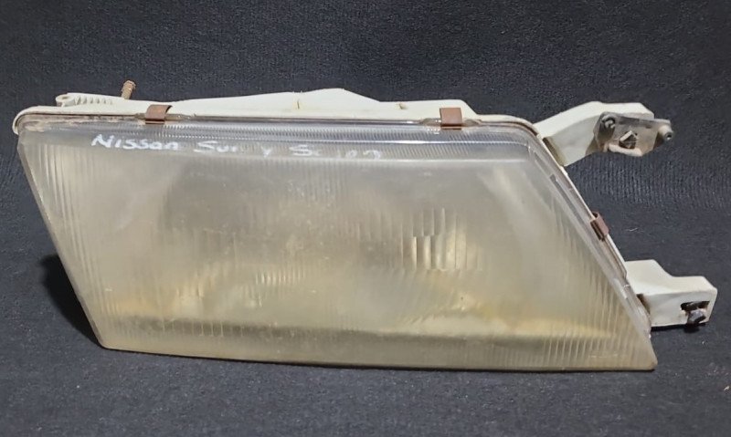 Faro delantero Nissan Sunny RH