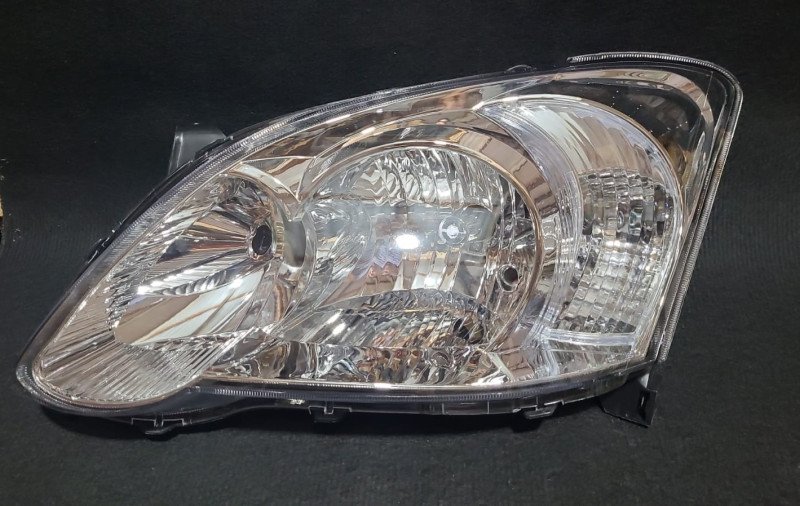 Faro delantero Toyota Runx 05 LH 