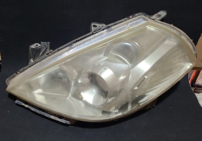 Faro delantero Nissan Tiida LH 