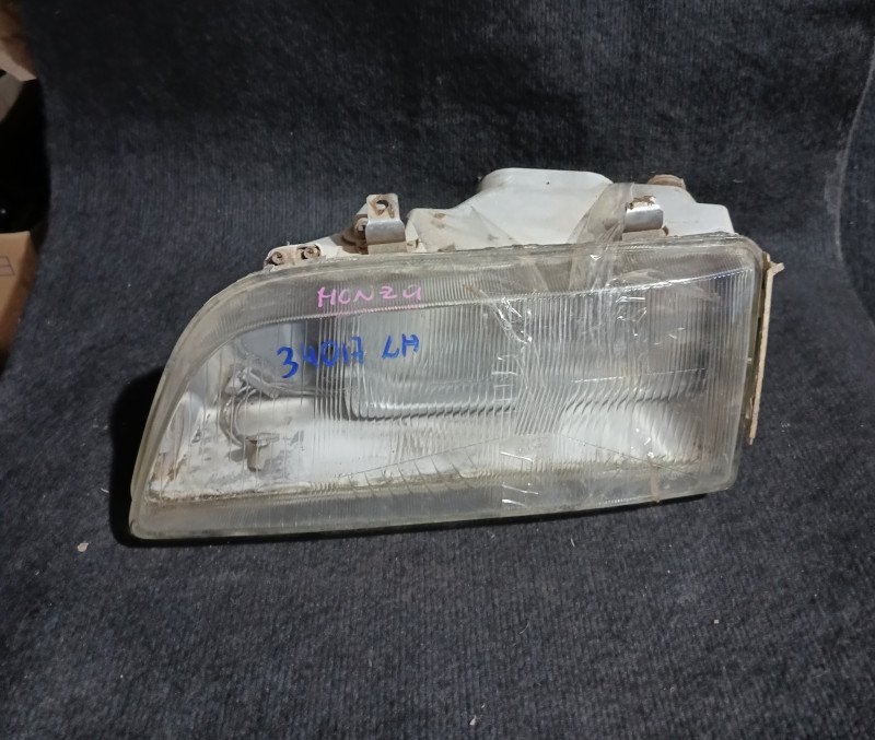 Faro delantero Mazda Premacy LH