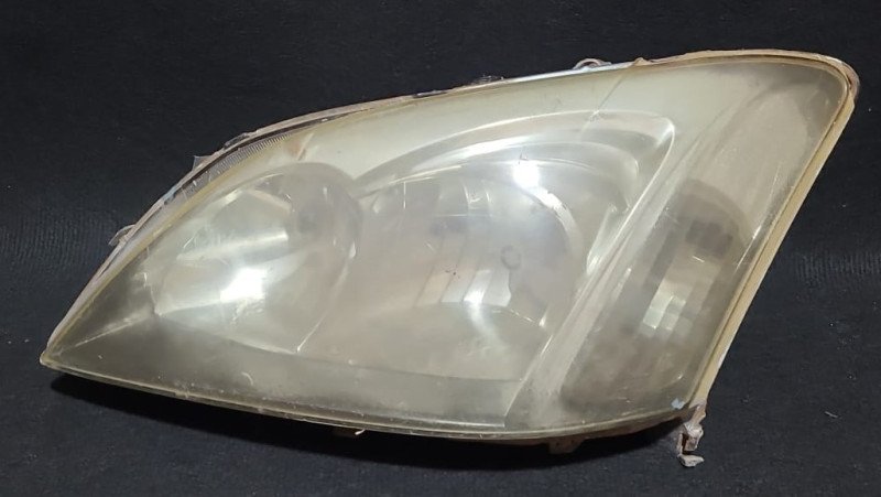 Runx 03 Faro delantero RH (frente chino) - Original