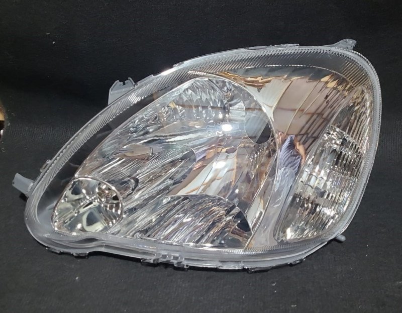 Faro Delantero Toyota Vitz lagrima LH