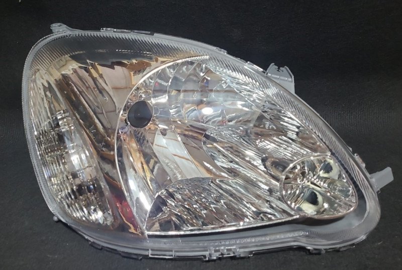 Faro Delantero Toyota Vitz lagrima RH 