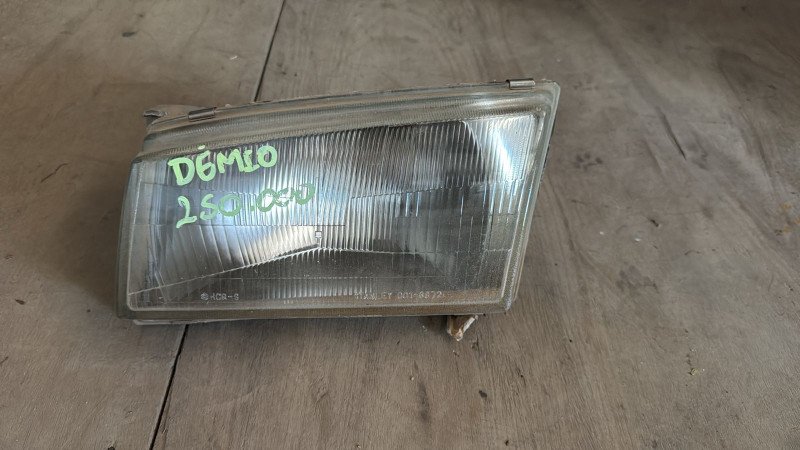 Faro delantero Demio Mazda LH 