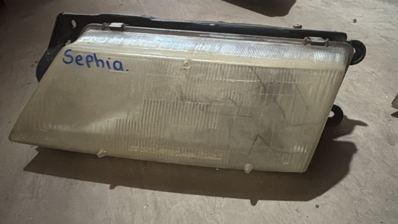 Faro delantero Kia Sepia LH 