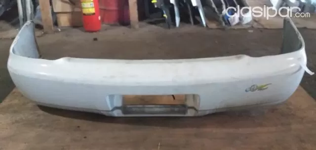 Paragolpe envolvente trasero Toyota Platz (usado)