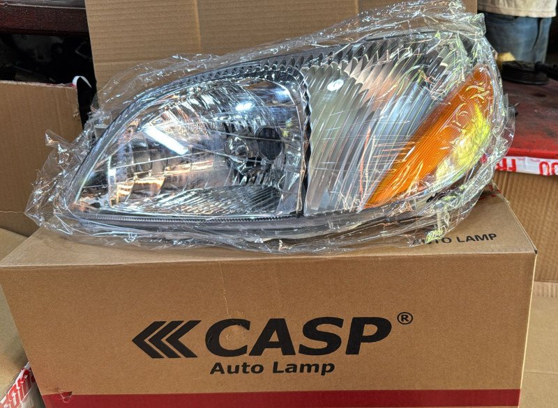 Faro delantero Toyota New Platz 03 LH