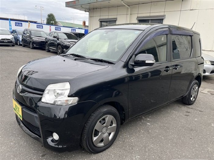 Retrovisor Toyota Sienta RH con señalero
